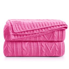 two pink towels folded on top of each other