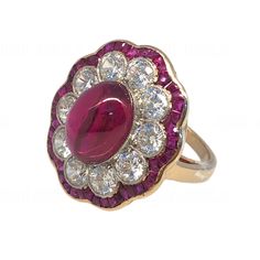 The Ring is made of 925 Silver set with Simulants of Ruby and Diamond Main stones can be replaced on request with a Stone Color of your Choice. This item can be made in Solid Yellow, White or Rose Gold variations of 10K,14K,18K as per your demand. The additional options Provided are Simulant versions of the said gemstones and not natural Gemstones. These are custom made items and are made to order. Request to please clarify all your doubts and queries before placing your order. Payment: We accep Fine Jewelry Ruby Cabochon Ring In White Gold, Fine Jewelry Cabochon Ruby Ring In White Gold, Fine Jewelry White Gold Ruby Ring With Cabochon, Fine Jewelry White Gold Cabochon Ruby Ring, Fine Jewelry Ruby Cabochon Ring, Fine Jewelry Diamond Cabochons For Wedding, Elegant Ruby Rings With Oval Cabochon Center Stone, Ruby Rings With Center Stone, Oval Cabochon Shape, Fine Jewelry Cabochon Gemstones For Wedding