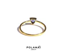 Tanzanite Ring 14k Gold . Trillion Ring . Solid Gold Gemstone Ring .Triangle Ring . Stacking Ring. Yellow White Gold Ring . Polamai One flawless, trillion cut, natural Tanzanite gemstone set in solid gold. Fans of tanzanite will know that this stone has an incredible intensity. We use only top grade, flawless tanzanite for this design. Available in white, yellow and rose 14k gold. ❂ Stone: Natural Tanzanite (origin Tanzania) ❂ Stone Size: 5 x 5mm approximately. ❂ Stone Quality: AAA Flawless ❂ Ri Fine Jewelry Yellow Gold Trillion Cut Ring, Trillion Cut Sapphire Ring In 14k Yellow Gold, Trillion Cut Yellow Gold Sapphire Ring, 14k Gold Trillion Cut Sapphire Ring, Trillion Cut Sapphire Ring In 14k Gold, Gold Trillion Cut Gemstone Ring, Gold Solitaire Jewelry With Trillion Cut, Yellow Gold Tanzanite Solitaire Jewelry, Gold Trillion Cut Solitaire Jewelry