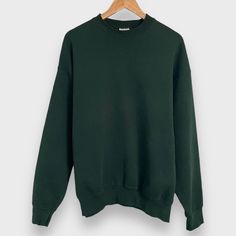 Vintage 1990's blank forest green crewneck sweatshirt. Pro Spirit tag size XL, made in USA. Light wear. Contact us with any questions, as we do not accept returns.   Actual measurements: 26" pit to pit 30" top to bottom   Instagram: @IdleHandsVintage Green Crew Neck Sweater, Basic Green Sweatshirt With Ribbed Cuffs, Green Basic Sweatshirt With Ribbed Cuffs, Plain Crew Neck Sweater For Streetwear, Basic Green Long Sleeve Sweater, Green Relaxed Fit Crew Neck Sweater, Green Crew Neck Sweater For Streetwear, Oversized Green Crew Sweatshirt, Green Relaxed Fit Sweater For Streetwear