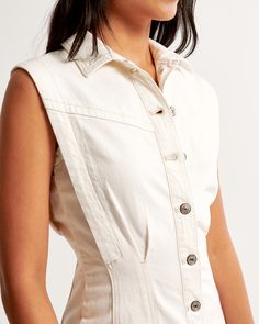 Elevate your wardrobe with the chic and timeless Women's Collared Denim Shirt Dress from Abercrombie & Fitch. This cream-colored dress combines elegance with casual comfort, making it a versatile addition to any fashion-forward collection.

- Size: XL TALL
- Color: Cream
- Material: Cotton, Polyester, Elastane
- Gender: Female
- Age Group: Adult
- Features: Slim fit, fully functional button-through front, flattering seaming details

Crafted in a soft and stretchy denim blend, this dress ensures Spring Denim Dress With Snap Buttons For Work, Button-up Denim Dress For Workwear, Fitted Button-up Denim Dress For Work, Chic Cotton Denim Dress With Buttons, Chic Cotton Denim Dress With Button Closure, Cotton Denim Dress With Snap Buttons For Work, Chic Denim Dress With Button Closure, Summer Work Denim Dress, Fitted Collared Denim Dress With Buttoned Pockets