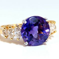 Amethyst Traditional 4.45ct. Brilliant Natural Amethyst Amazing Round Brilliant Cut Clean Vvs Clarity Beautiful Purple Sparkles Throughout 10.8mm Side Natural Marquise Diamonds Total: 1.10ct. I Color, Si-2 Clarity Depth Of Ring: 7.2mm Current Size: 8.75 14kt Yellow Gold 4.2 Grams Formal Round Cut Amethyst Gemstones, Luxury Amethyst Gemstones With Accent Stones, Luxury Amethyst Gemstones For Anniversary, Luxury Round Cut Amethyst Gemstones, Luxury Amethyst Gemstones With Prong Setting, Luxury Round Tanzanite Gemstones, Luxury Amethyst Gemstones Round Cut, Luxury Round Amethyst Gemstones, Luxury Tanzanite Gemstones