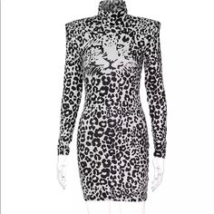 Bodycon Black & White Tiger Shoulder Pad Dress White Club Dress For Fall, White Fitted Bodycon Dress For Fall, Fitted White Bodycon Dress For Fall, White Mini Dress For Winter Night Out, White Bodycon Dress For Fall Evening, White Bodycon Dress For Fall Night Out, White Bodycon Dress For Night Out In Fall, Black And White Long Sleeve Party Dress, Black And White Long Sleeve Mini Dress For Spring