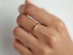 Diamond Baguette Ring, Handmade Stacking Ring, Dainty Minimalist Diamond Ring, Basic Diamond Band, Elegant Diamond Stackable Ring" This handcrafted diamond baguette ring is a delicate and minimalist piece, perfect for stacking or wearing alone. Its dainty design features sleek diamond baguettes set in a simple band, offering a touch of elegance and sophistication. Ideal as a basic yet stylish addition to any jewelry collection. Classy baguette diamond ring. Available in 9k/14k/18k yellow, rose o Minimalist Emerald Cut Diamond Ring With Baguette Diamonds, Minimalist Emerald-cut Baguette Diamond Ring, Modern Everyday Diamond Ring With Diamond Cut, Modern Everyday Diamond Cut Ring, Minimalist Diamond Ring With Baguette Cut, Minimalist Baguette Cut Solitaire Wedding Ring, Minimalist Baguette Cut Diamond Promise Ring, Minimalist Single Diamond Baguette Cut Ring, Minimalist Baguette-cut Diamond Ring