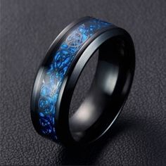 Brand New Black Stainless Steel Sapphire Blue Irish Design Men's Wedding Band Ring Sizes 8 #Christmas #Wedding #Gift #Unique #Birthday #Love #Promise #Engagement #Sapphire #Blue Feel Free To Ask Any Questions. Please Note: All Items Are Cross Posted, Please Ask Availability Prior To Buying Everything Must Go! Check Out My Page & Follow Me For Items Added Often! Bundle And Save On Shipping! Fast Shipping W/Tracking Always Monday Through Friday! Dragon Magic, Steel Dragon, Dragon Blue, Traditional Wedding Rings, Celtic Wedding Rings, Dragon Ring, Topaz Engagement Ring, Daily Gift, Magic Ring