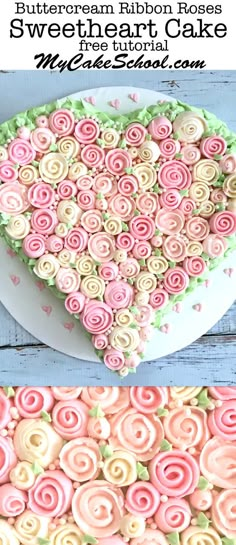 a heart shaped cake with pink and green frosting on top, next to a white plate