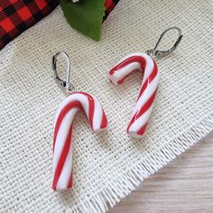 two candy canes sitting on top of a table