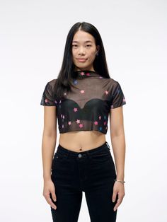 The Star Confetti Crop Top | Sheer Mesh Shirt in Black with Pink and P Sheer Mesh Top Y2k Summer Style, Black Mesh Cropped Top, Sheer Mesh Top, Y2k Style For Summer, Black Y2k Mesh Top For Spring, Black Mesh Y2k Top For Spring, Black Y2k Mesh Top For Summer, Fitted Star Print Summer Tops, Y2k Black Mesh Top For Summer, Black Stretch Top With Star Print