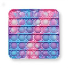 an image of soap bubbles in the shape of circles on a blue and pink tray