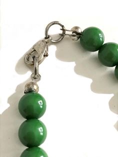 "A large vintage 1960s mod green beaded necklace this necklace is made of green plastic round beads clasp closure works excellent gives your outfit a nice pop of color in excellent vintage condition, no flaws to mention. measurements: length necklace : 10\" total length chain: 21 1/2\" item number: 6278" 1960s Mod, Green Beaded Necklace, Length Necklace, 60s Mod, Plastic Beads, Vintage 1960s, Item Number, Round Beads, Costume Jewelry