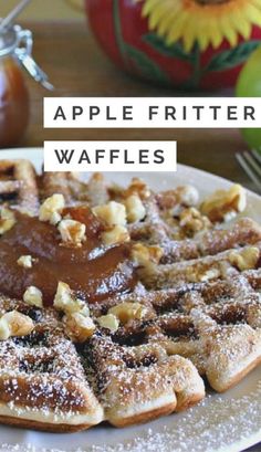 apple fritter waffles on a white plate with apples in the background