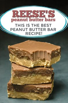 three pieces of peanut butter bars stacked on top of each other in front of a sign that says reese's peanut butter bars