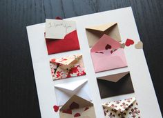 several different types of envelopes with hearts on them