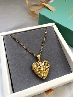 Beautiful Heart-Shaped Medallion Necklace. Made in stainless steel, highly gold polished. Can open as seen on a photo. An ideal accessory for any occasion. It's the perfect gift for your girlfriend, mom or best friend. It comes in a beautifully designed box, ready to be presented to that someone special of yours. Whether you're expressing your love, celebrating a special moment, or simply embracing your own beauty, this necklace is a symbol of timeless elegance.✨💛 All of our items are nicely packaged ready to gift in elegant jewelry boxes 🎁✨ Length: 50cm If you have have any questions don't doubt getting in touch with me, I will be delighted to answer you❤️ Gold Plated Heart Locket Necklace As A Gift, Gold Plated Heart Locket Necklace Gift, Gold Heart-cut Locket Necklace For Gift, Gold Open Heart Locket Necklace Gift, Gold Heart-shaped Locket Necklace With Adjustable Chain, Heart-shaped Gold Locket Necklace With Adjustable Chain, Elegant Gold Heart Locket Necklace, Wedding Heart Pendant Gold Plated Locket Necklace, Gold Locket Necklace As Gift For Her