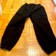 Cotton Cargo Jogger Pants With Pockets Black Full-length Joggers With Pockets, Black Full Length Joggers With Pockets, Black Joggers With Pockets, Black Cargo Pocket Sweatpants, Black Cargo Style Joggers, High Waist Black Bottoms For Outdoor, Casual Black High-waisted Joggers, Black Ankle-length Cargo Pants With Pockets, Black Utility Bottoms With Elastic Waistband