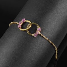 GemFormingStudio D E T A I L S Pink Tourmaline Bracelet | Gemstone Bracelet | Gold Bracelet | Birthstone Bracelet | Chain Bracelet | Rope 24k Chain Bracelet | Gift For Her [GFS4659] Stone Name : Pink Tourmaline Stone Size: 7 x 7 mm Weight: 5.47 gm Material: Brass Polish: All Plating are Available . Contact us for wholesale prices. R I N G S https://www.etsy.com/in-en/shop/GemFormingStudio?section_id=22783374 B E A D S https://www.etsy.com/in-en/shop/GemFormingStudio?section_id=22828835 W A N D S Spiritual Amethyst Gold Bracelets, Adjustable Gold Crystal Bracelet With Gemstone, Adjustable Gold Crystal Gemstone Bracelet, Gold Amethyst Beaded Bracelets, Gold Amethyst Gemstone Bracelets, Adjustable Yellow Gold Crystal Bracelet, Gold Gemstone Crystal Bracelet, Gold Crystal Gemstone Bracelet, Adjustable Yellow Gold Round Crystal Bracelet