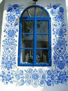 an image of a window with blue and white paint