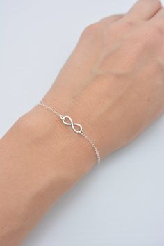 HAND-MADE OF SOLID STERLING SILVER PARTS - A GREAT KEEPSAKE I make this beautiful bracelet using a tiny 1/2 inch sterling silver infinity charm with an antiqued finish. Set on sterling silver chain, this bracelet secures with a lobster clasp. Each comes in a gift box, perfect for gift-giving. These make great group gifts. SIZING - IMPORTANT: To determine bracelet size, measure around your wrist and add 1/2 inch to get your bracelet size. Do not order in your exact wrist measurement as it will NO Silver Infinity Bracelets, Infinity Charm, Group Gifts, Grade 8, Bracelet Sterling Silver, Hand Made Jewelry, Sterling Silver Chain, Stone Bracelet, Chain Link Bracelet