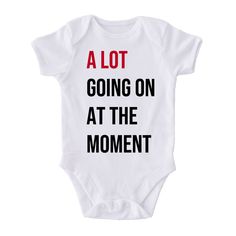 This baby bodysuit is the cutest Swiftie baby ensemble! Our white infant bodysuits are made with 100% Cotton official Gerber Onesies® brand bodysuits. Available in short or long sleeves. See size chart in Details tab below.

Shop our entire Eras Collection here! White Pre-shrunk Cotton Onesie, White Short Sleeve Bodysuit With Letter Print, Fitted White Onesie For First Birthday, Funny Short Sleeve White Onesie, White Fitted Onesie For First Birthday, Funny White Short Sleeve Onesie, White Cotton Onesie For Gender Reveal, White Short Sleeve Onesie For First Birthday, White Bodysuit With Name Print For First Birthday