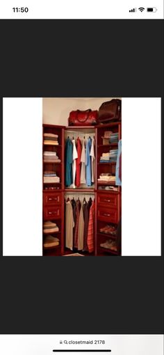 an open closet with clothes hanging on it