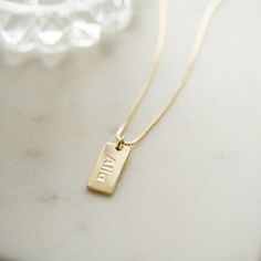 Personalized name & date necklace made just for you! Perfect for remembering key dates like weddings & anniversaries, graduations, and so much more! - - - D E T A I L S- - -• Made of 925 Sterling Silver• Available in 14k Gold, or Rhodium plated (we use a very THICK plating for a piece that will be with you for years to come!)• Nickel-free & Hypoallergenic• DIMENSION: 16mm x 8mm •Comes with a 3" Extension Chain ♡ HOW to ORDER: ♡1. Use the "PERSONALIZATION BOX" to input the DATE/NAME/LETTERS /SYMB Classic Personalized Necklaces For Anniversary, Classic Nameplate Necklace For Everyday, Rectangular Initials Jewelry For Anniversary, Classic Personalized Necklace For Anniversary, Classic Pendant Charm Necklace For Mother's Day, Classic Everyday Nameplate Necklace, Classic Personalized Anniversary Necklace, Classic Necklaces With Engraving Option For Anniversary, Classic Anniversary Necklaces With Engraving Option