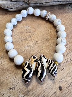 Bracelet Vietnam shell size 7/ stretchy/ howlite beads/ beach/pyrene shells Cheap Beaded Shell Bracelets, Shell Bracelet, Bracelet Sizes, Vietnam, Jewelry Bracelets, Shells, Beaded Bracelets, Size 7, Bracelet