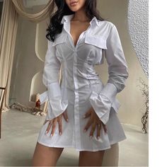 Material: Cotton & Polyester Bell Sleeves SIZE BUST LENGTH SHOULDER SLEEVES S 88-100cm (Appx.) 74.5cm (Appx.) 48cm (Appx.) 67cm (Appx.) M 92-104cm (Appx.) 76cm (Appx.) 49cm (Appx.) 68cm (Appx.) L 96-100cm (Appx.) 77.5cm (Appx.) 50cm (Appx.) 69cm (Appx.) NOTE: Please use the chart & measurements as guide only, because sizing and measurements will vary between cuts and designs. Elegant Fitted Shirt Dress With Pockets, Fitted Long Sleeve Shirt Dress For Office, Fitted Long Sleeve Shirt Dress With Pockets, White Long Sleeve Shirt Dress For Office, Fitted Long Sleeve Mini Dress With Pockets, White Collared Shirt Dress For Party, White Long Sleeve Party Shirt Dress, Fitted Mini-length Shirt Dress For Office, Fitted Mini Shirt Dress For Office