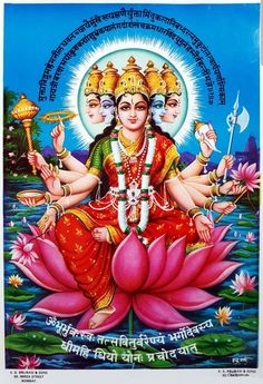 an image of the hindu god sitting on top of a lotus in front of water