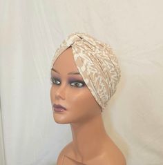 Handmade vintage style pretied front twist turban. This turban is a simple yet stylish cap made out of a soft feel jersey fabric.  This is perfect to be worn with hair up or down, indoors or outdoors, social and religious gatherings.  It's made in two layers therefore can provide warmth for your head and ears in cold weather while still remaining stylish.  This can serve as a gift to a loved one, wife, mum, sister, daughter or friend. It's a go to cap for women passing through illness, chemo, al Adjustable Pink Turban For Beach, Green Bohemian Turban One Size, Green Bohemian Turban, Luxury Evening Women's Turban, Chemo Head Scarf Vintage, Hair Up Or Down, Stylish Caps, Chemo Hat, Costume Hats