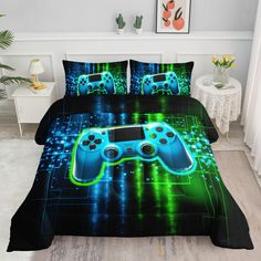 a bed with a video game controller printed on the comforter and pillow cover set