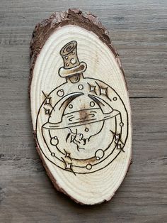 a piece of wood with a drawing on it