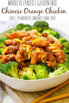 chicken and broccoli with orange sauce in a white bowl next to chopsticks