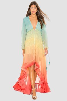 Embrace effortless elegance with this flowy sunset maxi dress. Featuring a vibrant sunset print, flattering empire waist, and breezy long sleeves, it's perfect for spring & summer. Soft, lightweight fabric drapes beautifully. Dress it up with heels or sandals for a chic look, or keep it casual with flats. Gradient Dress, Multicolor Maxi Dress, Bohemian Summer Dresses, Bohemian Rainbow, Boho Mode, High Low Maxi Dress, Bohemian Maxi, Elegant Maxi Dress, Bohemian Maxi Dress