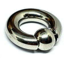 CBR / BCR RING Large size CBR ring Stainless Steel 0g (8mm)  12mm Ball 30 gram Weight Approx Priced per ring. 16mm inside Diameter Approx 31mm Outside Diameter Approx  This item is 100% as described, Metal, Gauge,Thickness, size or if your buying  Pendants as stated, Plated, silver or Base Metal. It is up to YOU and you alone to know what size or style you need We only supply the stated item in this listing that you are agreeing to purchase when you press BUY IT NOW. You understand this statement when pressing the buy it now, it is your responsibility. Ideally remove before bathing or swimming as standard. We advise you sterilize before you wear and item a good clean regularly. All body Jewellery sold by eclectic shop uk ltd is suitable for healed piercings only. If you have a reaction to Metal Gauge, Cool Piercings, Prince Albert, Large Ring, Body Jewellery, Selling Jewelry, Base Metal, Body Jewelry, Jewellery And Watches