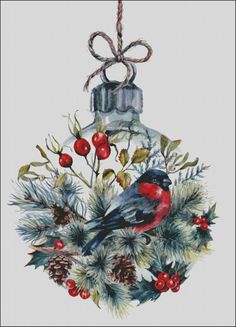 a watercolor christmas ornament with a bird on it's head and berries