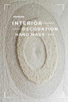 a white rug with the words interior decoration hand made on it and an image of a circular