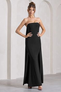 Make an unforgettable entrance at your upcoming event in this alluring maxi,Christina. Perfect for any black tie occasion, this black strapless dress is characterised by a split cape that flows elegantly as you move. Simple yet graceful,Christinawould be best styled with a tousled bun to give its bandeau neckline the attention it deserves.   Features  - Premium stretch jersey - Bandeau neckline - Split cape - Sleeveless  - Invisible zip closure  - Fishtail skirt - Maxi length    Sizing & Fit  Model is 5'7' and wears UK size8 / US size 4   Product Information     Double layered with good stretch  Premium jersey in Black (95% Polyester, 5% Elastane)  155cm total length  SKU: CL129804002 Dress With Cape, Black Bandeau, Black Dress Prom, Fishtail Skirt, Black Tie Gala, Black Strapless Dress, Party Dress Long Sleeve, Skirt Maxi, Bridesmaid Outfit