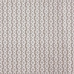 a white and brown wallpaper with circles on it