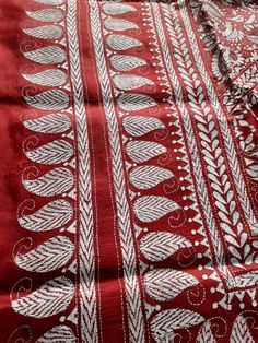 Item....Kantha stich saree Fabric...Tussar silk Silkmark certified Hand kantha stich embroidary Length... Saree 5.5 mtr Bp...1 mtr Width...45 inch Dry wash only For more collection click my shop link https://www.etsy.com/in-en/shop/RitaboutiqueCrafts?ref=search_shop_redirect Please favourited my shop for new update notification Luxury Cotton Silk Saree With Resham Embroidery, Cotton Saree With Chikankari Embroidery, Red Cotton Saree For Wedding, Red Cotton Unstitched Saree, Cotton Saree With Chikankari Embroidery For Navratri, Festive Mulmul Pre-draped Saree With Pallu, Navratri Saree In Mulmul With Cutdana Detailing, Navratri Mulmul Saree With Cutdana Detailing, Navratri Mulmul Saree With Cutdana