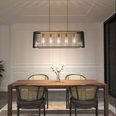 a dining table with four chairs and a chandelier hanging from it's ceiling