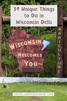 a wooden sign that says, 39 unique things to do in wisconsin dells welcomes you