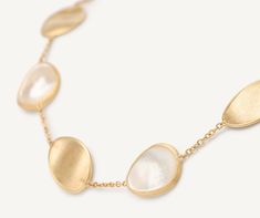 Elegant and minimalist, this necklace comprises a regular sequence of light 18K yellow gold leaves and mother of pearl. The gold leaves are hand-engraved using the ancient Florentine technique, alternated with a slender chain. Perfect to complete any look and add a finishing touch of light. Luxury Gold Pearl Necklace In Mother Of Pearl, Elegant Yellow Gold Mother Of Pearl Jewelry, Gold Mother Of Pearl Necklace With Polished Finish, Yellow Gold Round Mother Of Pearl Jewelry, Yellow Gold Jewelry With Mother Of Pearl, Round Shape, Ancient Tools, Branded Gifts, Pearl Size, Handmade Design