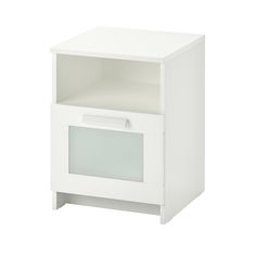 a white night stand with an open drawer on the bottom and one door in the middle