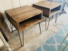 two wooden tables with hairpin legs are sitting on the floor next to each other