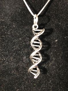 This DNA pendant is perfect for your family genealogist! And if your family doesn't have one, I bet you have a friend that loves digging into all that history. Either way, this one as absolutely fabulous for anybody who lives for old records!  Combined shipping available Dna Necklace, Old Records, Absolutely Fabulous, Pave Diamonds, Glass Pendants, Pendant Necklaces, Necklace Etsy, Jewelry Necklace Pendant, Necklace Lengths