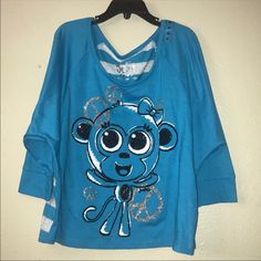 Justice, Girls Blue Top With Cute Monkey Print Front And Gray Stripes On Back. 3/4 Long Sleeves. Size 10. Brand New. Light Blue Casual Top With 3/4 Sleeves, Cute Long Sleeve Blue Tops, Playful Blue Long Sleeve Top, Blue Long Sleeve Playful Top, Blue Trendy Top With 3/4 Sleeves, Justice Clothes, Clothes Haul, Justice Store, Dancer Shirt