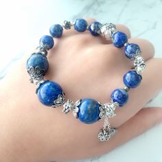 📝Material and Size Lapis Lazuli beads: around 8.5-12.5mm zinc alloy decoration beads, some of the beads are darker for the old vintage style Bracelet length: adjustable around 15cm 💜You will receive the exactly same bracelet as shown in the photo. 💜This handmade Jewelry listing come with an anti-oxidized jewelry box. 💜Please check all measurements and pictures before purchasing. Please keep in mind colors may appear different on screens. 💜All jewelry sold in our store including information Adjustable Beaded Alloy Bracelets, Adjustable Alloy Beaded Bracelets, Handmade Adjustable Alloy Bracelets, Adjustable Bohemian Alloy Bracelet, Metal Beaded 8mm Bracelet, Metal Bead Bracelet 8mm, Metal Bracelet With 8mm Beads, Silver Metal Beaded Bracelets With 8mm Beads, Handmade Alloy Bracelets Perfect As Gifts