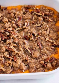 a casserole dish filled with meat and nuts