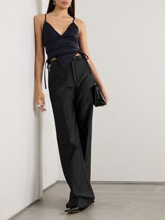 Belgian designer Marie Adam-Leenaerdt’s collections are defined by exaggerated proportions. These pants are made from satiny stretch-scuba and have a high-rise waist and floor-pooling wide legs. Wear yours with a tucked-in tank and chunky sneakers. Luxury Satin Bottoms For Evening, Luxury Satin Pants For Workwear, Luxury Satin Pants For Work, Luxury Satin Straight Pants, Luxury Satin Trousers, Silk Tapered Leg Bottoms For Evening, Fitted Luxury Satin Bottoms, Luxury Fitted Satin Bottoms, Chic Silk Pants For Night Out