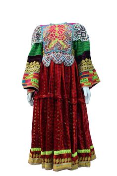 This is an authentic vintage Afghan Kochi dress.  Please get in touch with me for the exact size. Note: Worn and minor signs of wear. Vintage Embroidered Fall Dresses, Vintage Dresses For Festivals, Vintage Multicolor Embroidered Dress, Traditional Red Fall Dresses, Vintage Red Patchwork Dress, Red Vintage Dress With Patchwork, Vintage Red Dress With Patchwork, Festive Embroidered Vintage Dress, Vintage Fitted Dresses For Festivals